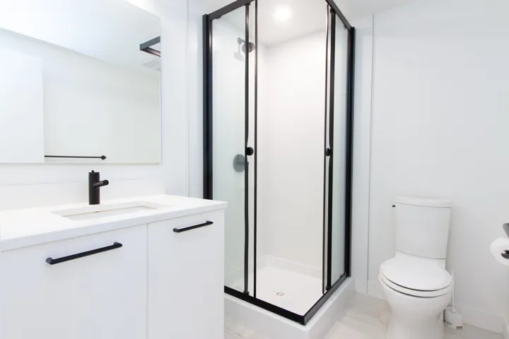 Full bath featuring vanity and a stall shower