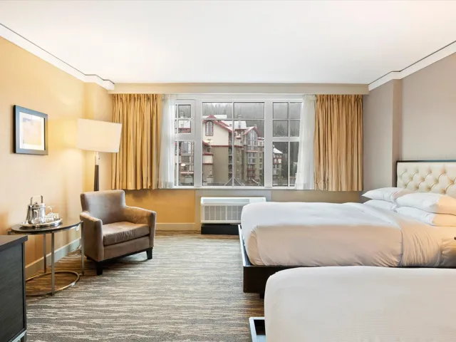 Bedroom featuring radiator heating unit, baseboards, and ornamental molding