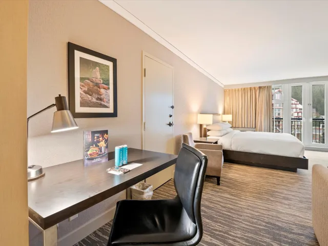 Carpeted bedroom with ornamental molding