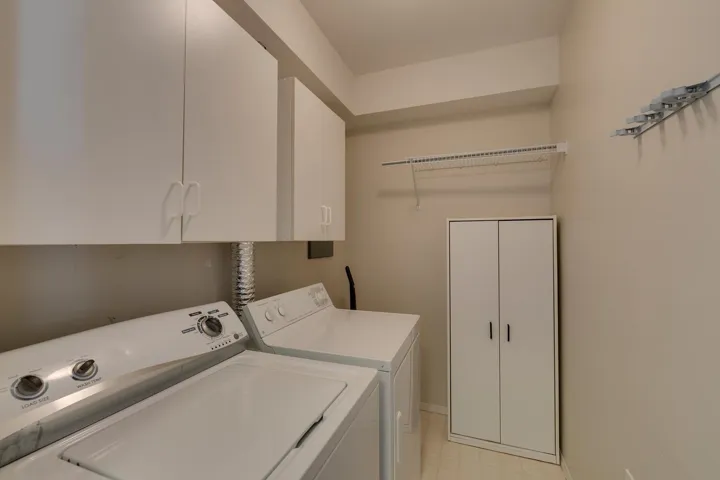Laundry room with separate washer and dryer