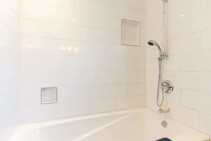 Bathroom featuring shower / washtub combination