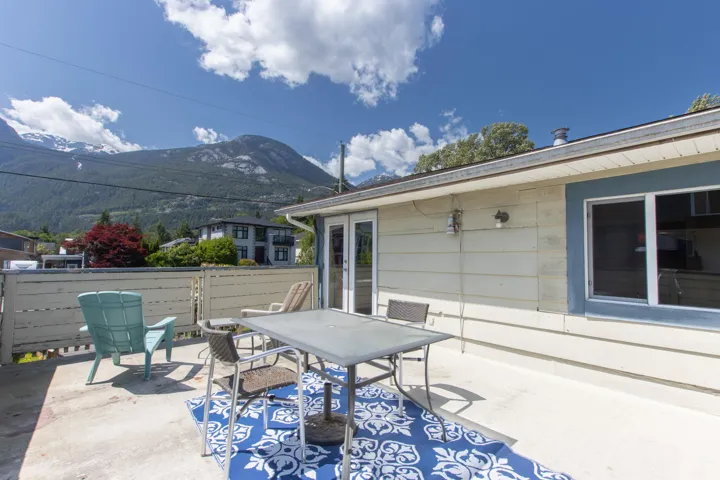 View of patio / terrace featuring a mountain view and outdoor dining space