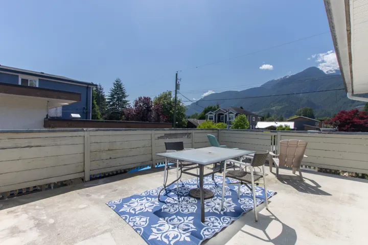 View of patio / terrace with outdoor dining area and a mountain view