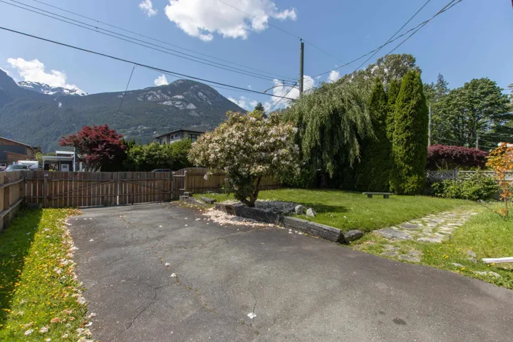 View of patio featuring a gate and a mountain view