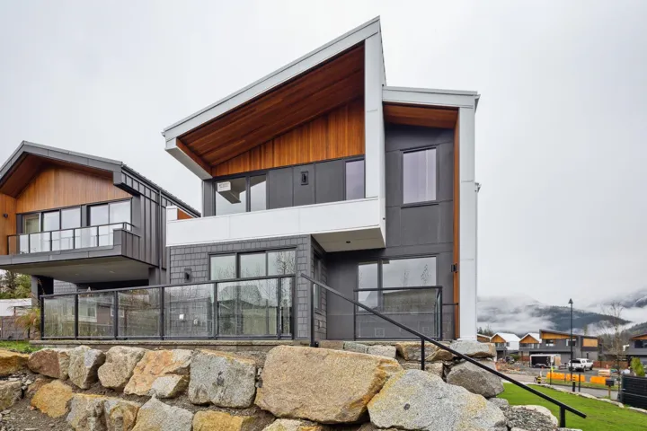 Back of house featuring a balcony