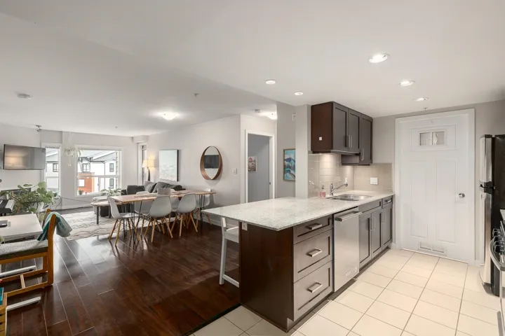Open kitchen facing dining and living room