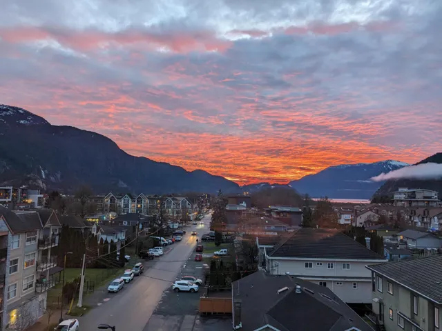 Sweeping mountain scenery featuring a vibrant evening sky