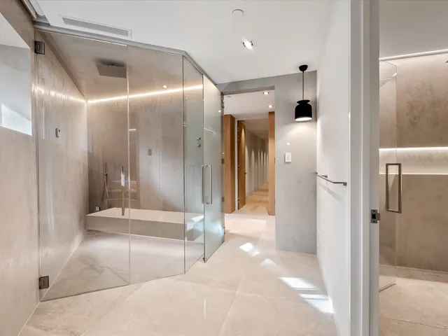 Bathroom featuring a stall shower and a bath