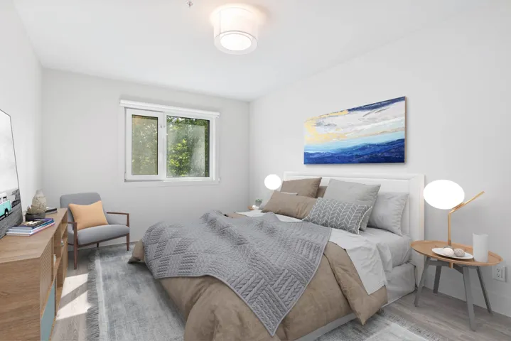 Bedroom with wood finished floors