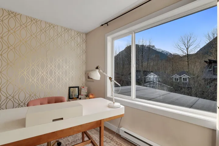 Expansive window offering mountain scenery