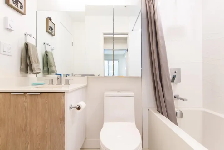 Full bathroom with vanity and shower / tub combo with curtain