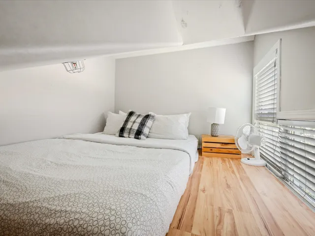 Bedroom with light wood-type flooring