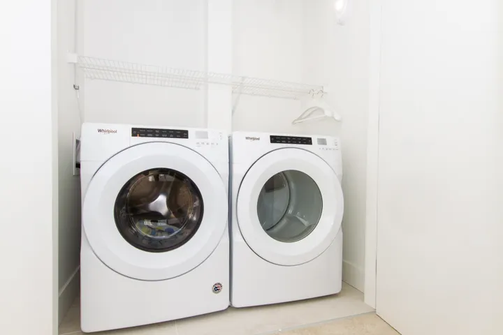 Laundry room with washing machine and dryer