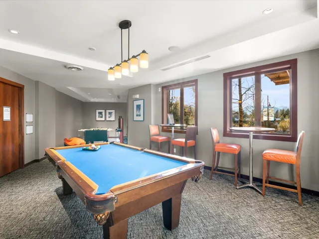 Playroom with pool table and recessed lighting