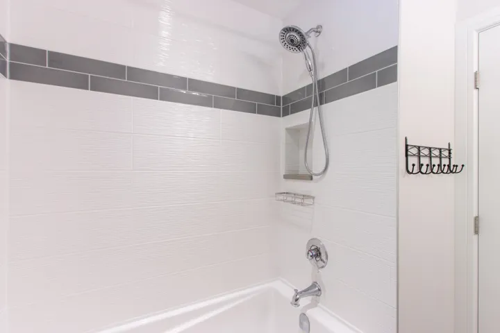 Full bathroom with shower / tub combination