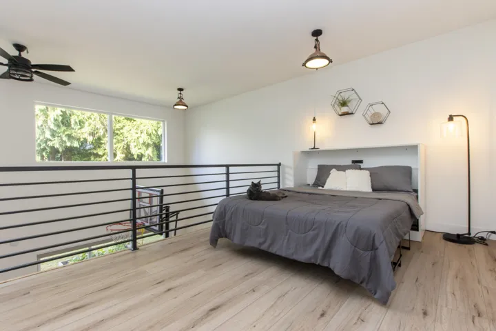 Bedroom with light wood-style floors