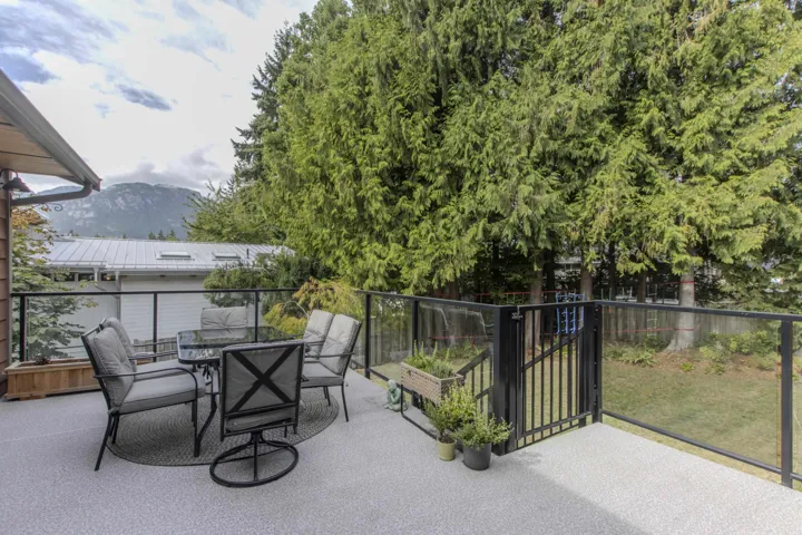 View of patio / terrace with a mountain view and outdoor dining space