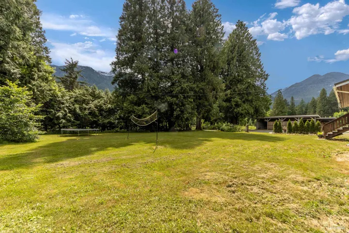 View of green lawn with a mountain view