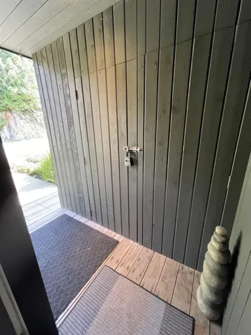 Storage room closet opposite Entry Door on Parking Lot level.