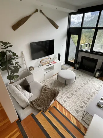 View of other south side of the sunken living room, as viewed from the Dining Area above.