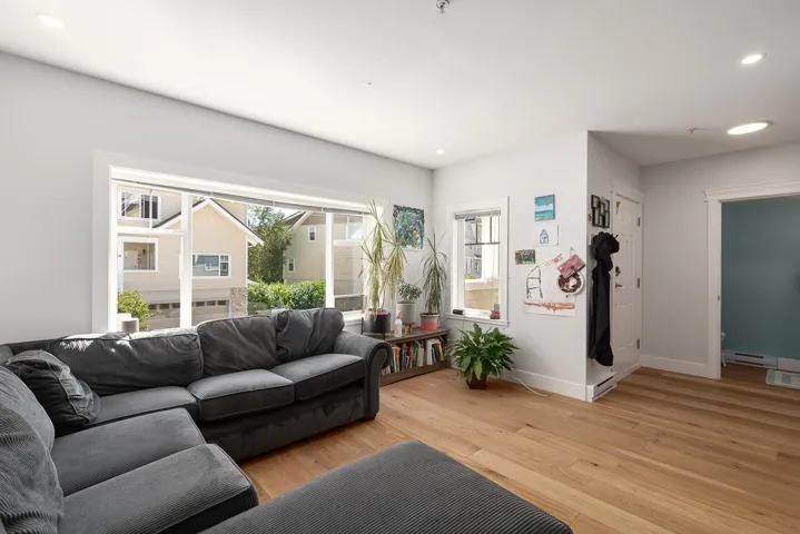 Living room featuring recessed lighting and light wood-style floors