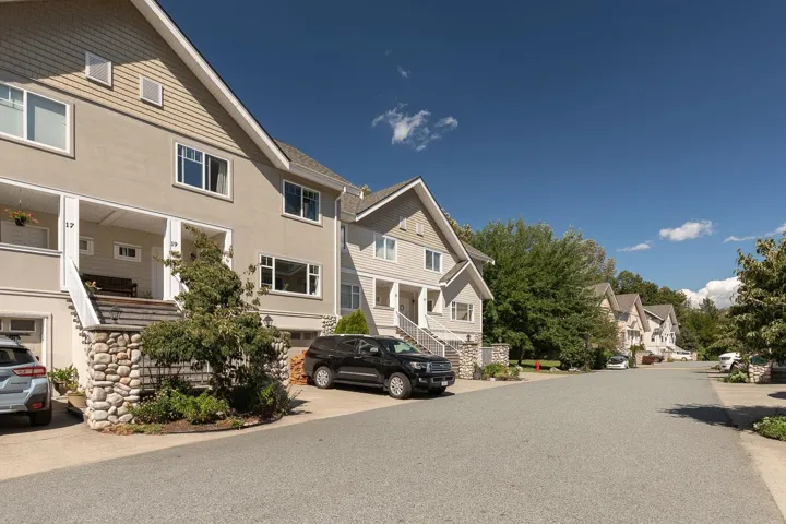 View of asphalt street featuring a residential view