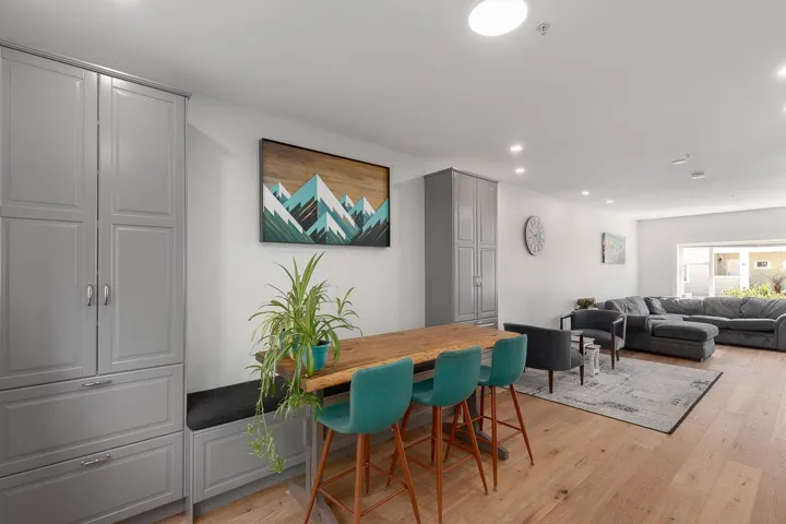 Dining area featuring light wood-style flooring and recessed lighting