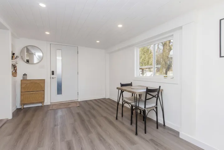 Dining space featuring recessed lighting, light wood-style flooring, and wood ceiling