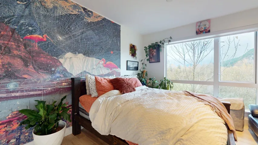 Bedroom with wood finished floors