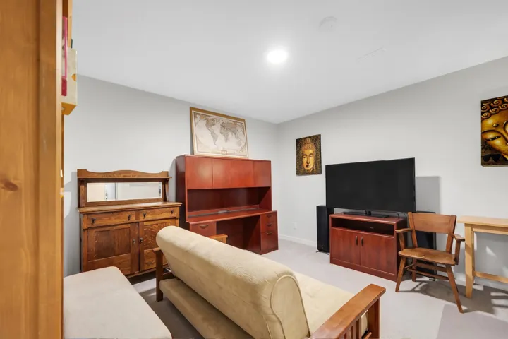 Versatile room featuring light grey walls, recessed lighting, and carpeted flooring