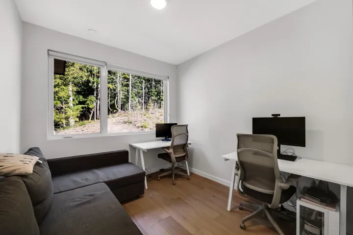 Office featuring light wood-type flooring and baseboards