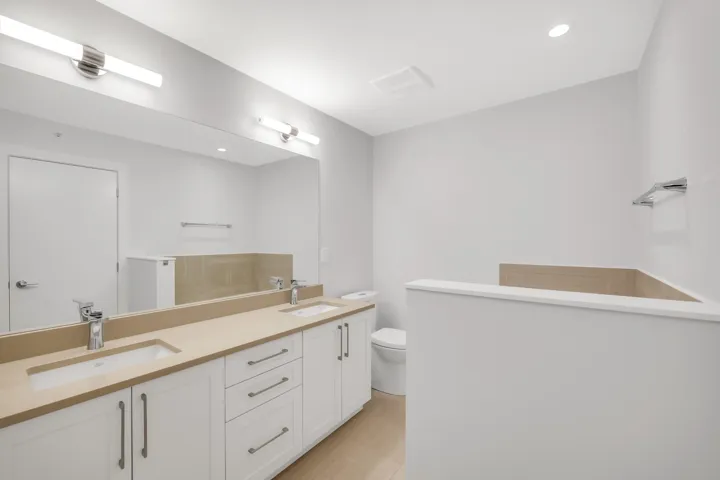 Bathroom with vanity and shower / bath combo