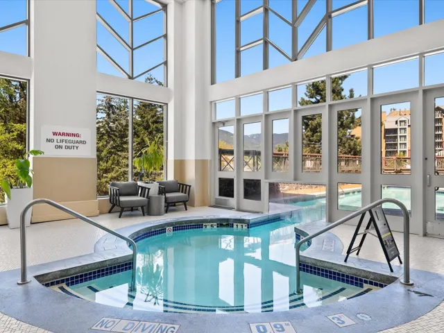 Pool featuring a hot tub