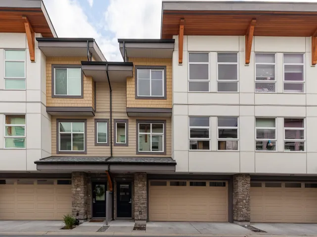 Modern townhome exterior featuring contemporary architectural design elements