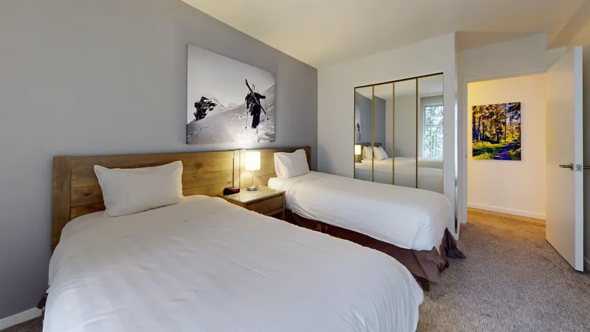 Bedroom with carpet and a closet