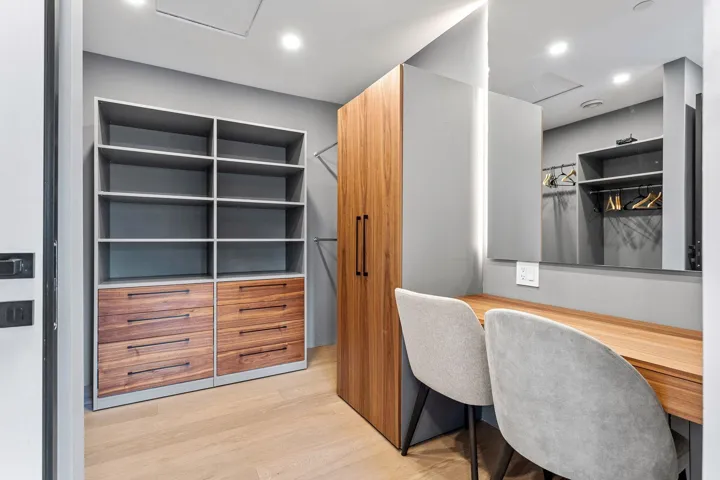 Home office with attic access and light wood-style flooring