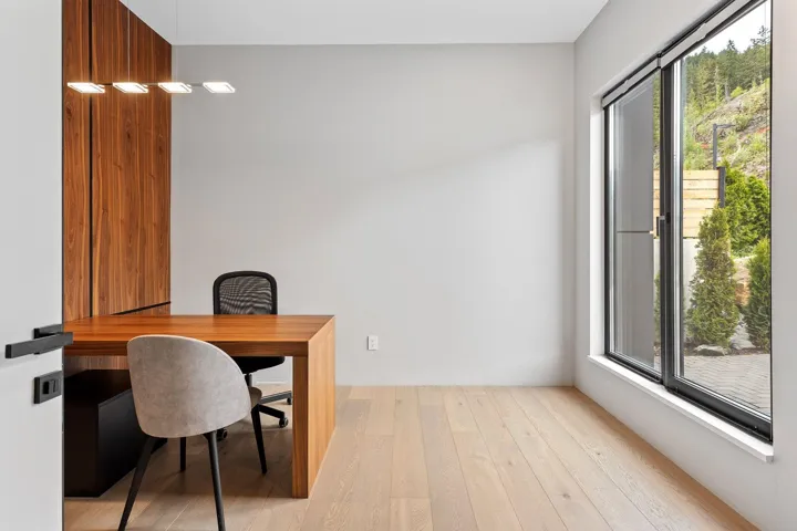 Office featuring plenty of natural light and hardwood / wood-style flooring