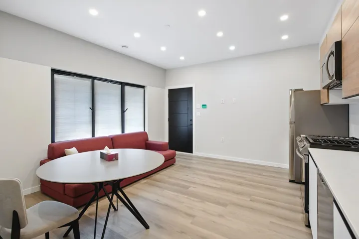 Dining room featuring light wood-style flooring, recessed lighting, and baseboards