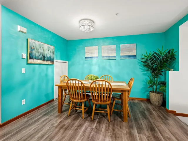 Dining room with baseboards and wood finished floors