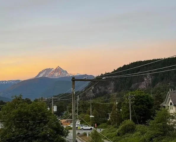 Mountain backdrop with snow-capped peaks