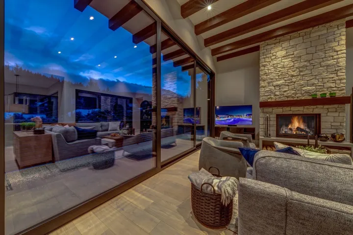 View of patio / terrace with an outdoor living space with a fireplace