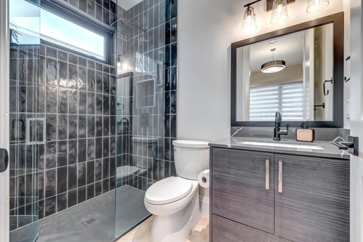 Bathroom with vanity and a walk in shower