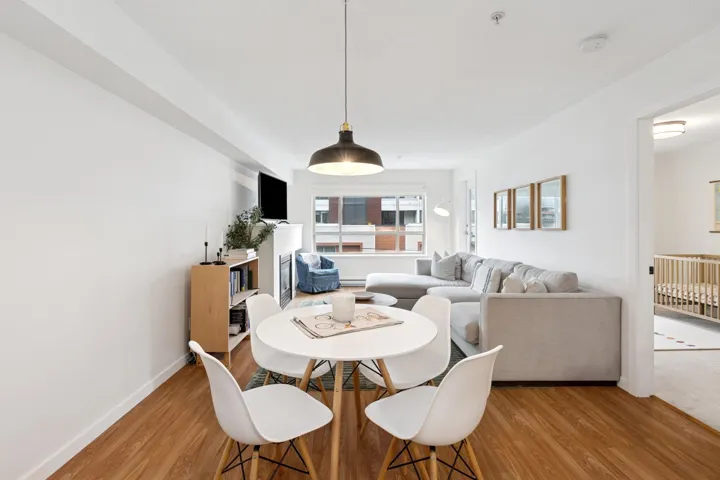 Dining area featuring wood finished floors and baseboards
