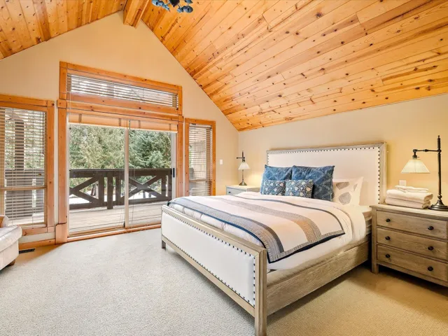 Premier bedroom has a vaulted ceiling, a balcony, and walking closet.