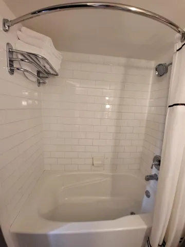 Full bathroom with shower / tub combo