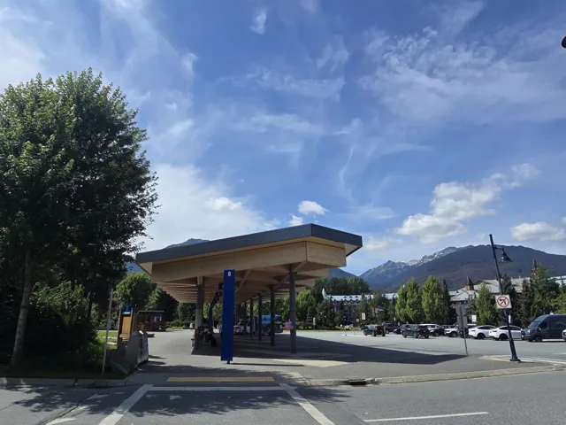 View of property's community featuring a mountain view and uncovered parking