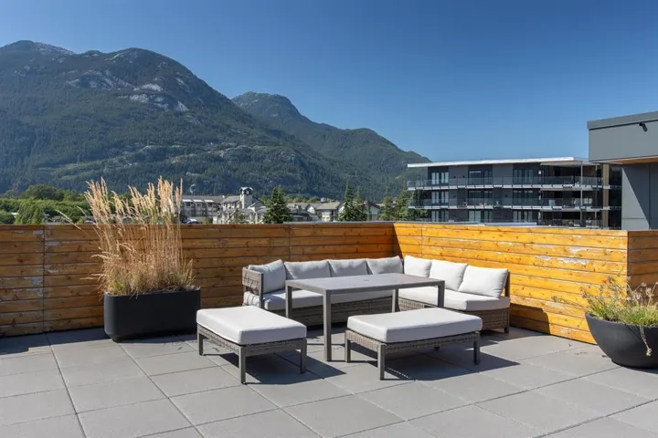 View of patio with an outdoor hangout area and a mountain view