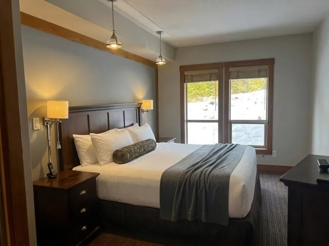 Bedroom featuring baseboards