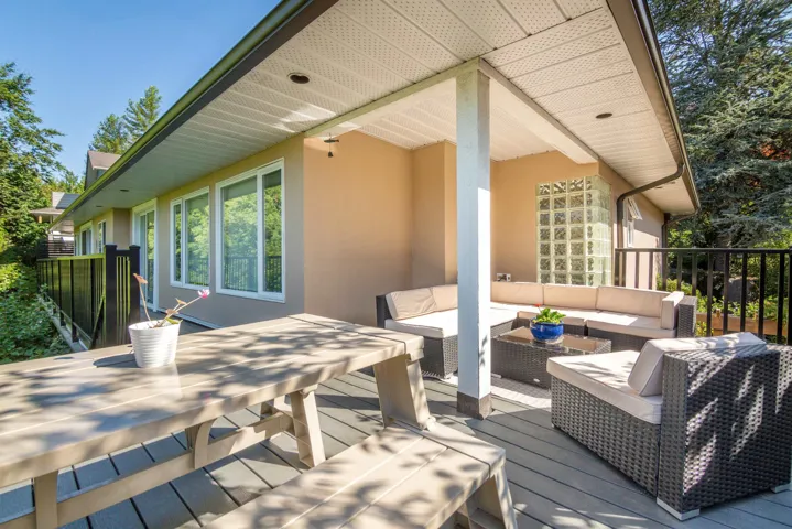 Wooden deck with an outdoor hangout area