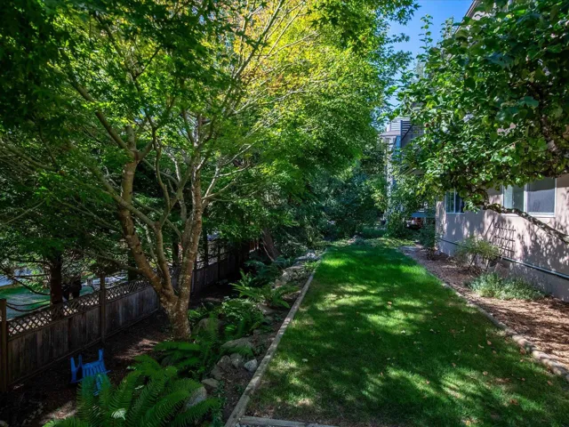 View of yard featuring fence